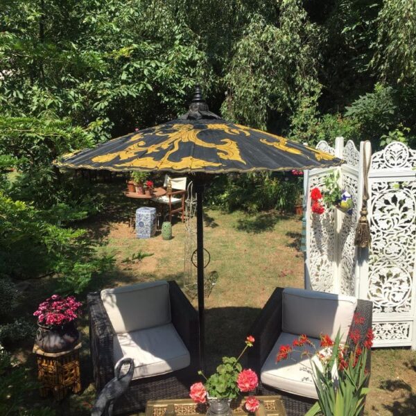 golden and black garden umbrella