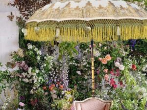 main white umbrella with yellow fringe