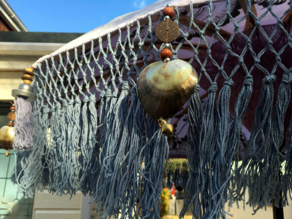 umbrella with shell dangly things