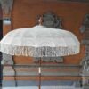 white macrame umbrella