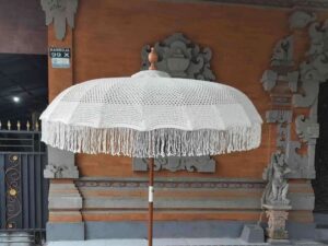 white macrame umbrella