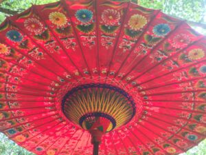 red garden umbrella